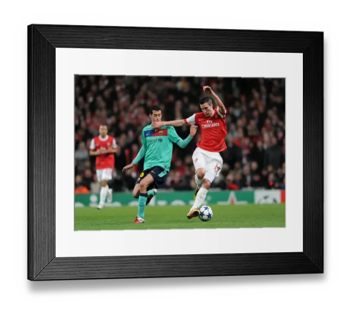 Framed Print : Robin van Persie (Arsenal) Sergio Busquets (Barcelona). Arsenal 2: 1 Barcelona Framed Print : Robin van Persie (Arsenal) Sergio Busquets (Barcelona). Arsenal 2: 1 Barcelona