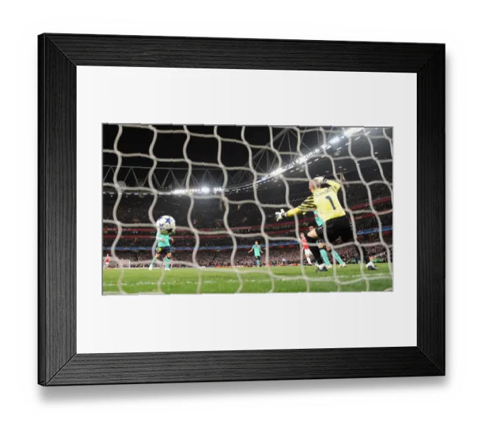 Framed Print : Andrey Arshavin shoots past Barcelona goalkeeper Victor Valdes to score the 2nd Arsenal goal