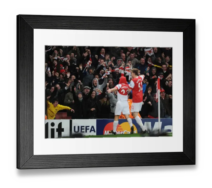 Framed Print : Arsenal fans celebrate the 2nd goal, scored by Andrey Arshavin. Arsenal 2: 1 Barcelona