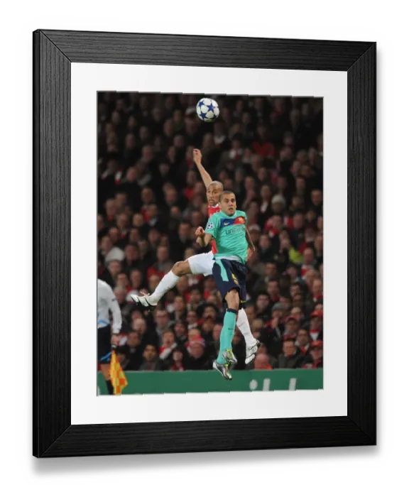 Framed Print : Gael Clichy (Arsenal) Daniel Alves (Barcelona). Arsenal 2: 1 Barcelona, UEFA Champions League Framed Print : Gael Clichy (Arsenal) Daniel Alves (Barcelona). Arsenal 2: 1 Barcelona, UEFA Champions League