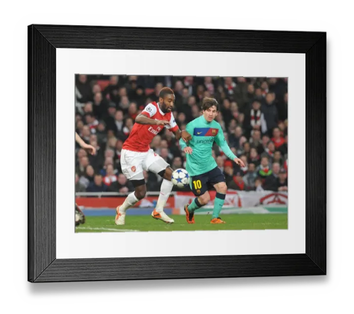 Framed Print : Johan Djourou (Arsenal) Lionel Messi (Barcelona). Arsenal 2: 1 Barcelona