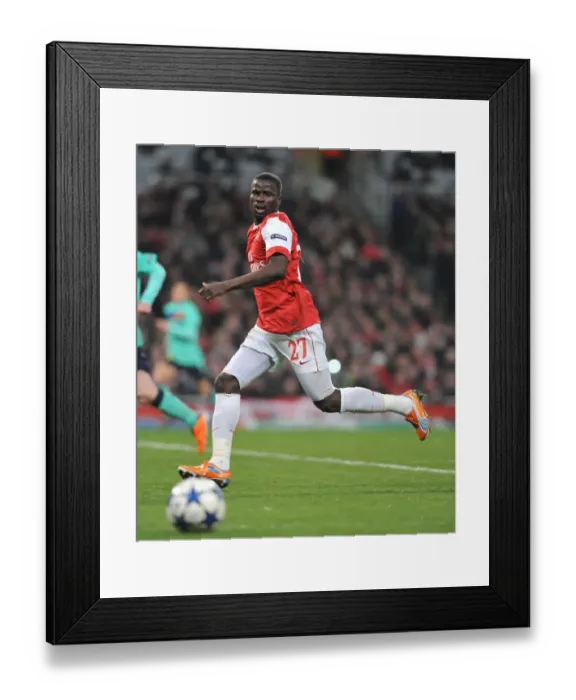 Framed Print : Arsenal's Emmanuel Eboue Celebrates Goal Against Barcelona in UEFA Champions League