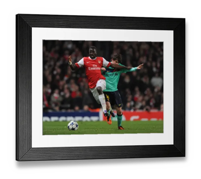 Framed Print : Emmanuel Eboue (Arsenal) Lionel Messi (Barcelona). Arsenal 2: 1 Barcelona Framed Print : Emmanuel Eboue (Arsenal) Lionel Messi (Barcelona). Arsenal 2: 1 Barcelona