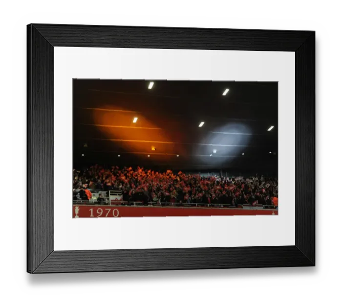 Framed Print : Arsenal's Historic 2-1 Victory over Barcelona in the UEFA Champions League at Emirates Stadium