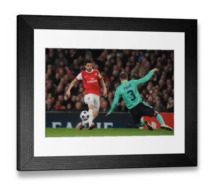 Framed Print : Cesc Fabregas (Arsenal) Gerard Pique (Barcelona). Arsenal 2: 1 Barcelona Framed Print : Cesc Fabregas (Arsenal) Gerard Pique (Barcelona). Arsenal 2: 1 Barcelona