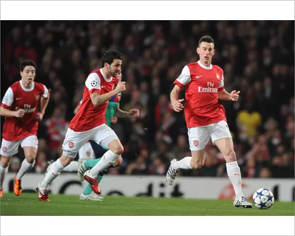 Laurent Koscielny and Cesc Fabregas (Arsenal). Arsenal 2: 1 Barcelona, UEFA Champions League