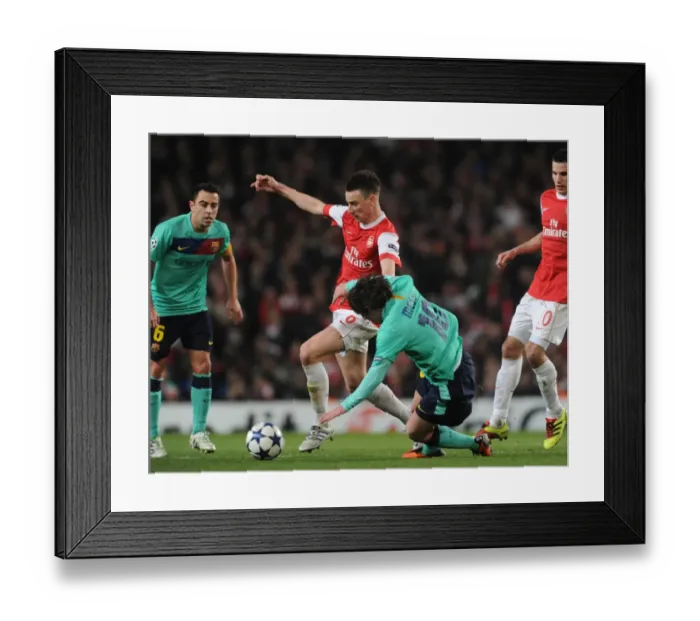 Framed Print : Laurent Koscielny (Arsenal) Lionel Messi (Barcelona). Arsenal 2: 1 Barcelona