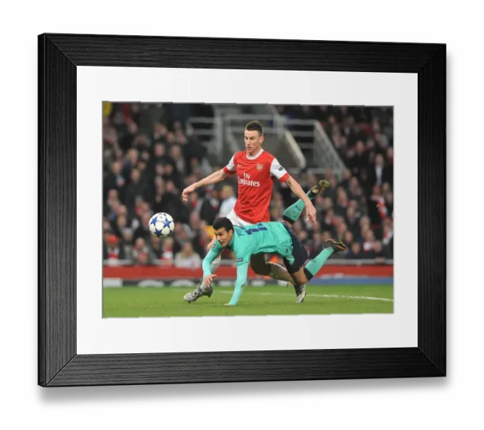 Framed Print : Laurent Koscielny (Arsenal) Pedro Rodriguez (Barcelona). Arsenal 2: 1 Barcelona