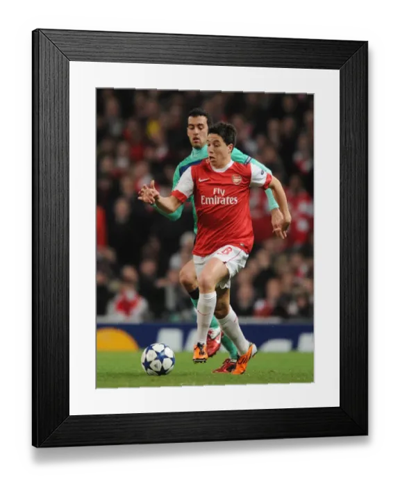 Framed Print : Samir Nasri (Arsenal) Sergio Busquets (Barcelona). Arsenal 2: 1 Barcelona Framed Print : Samir Nasri (Arsenal) Sergio Busquets (Barcelona). Arsenal 2: 1 Barcelona