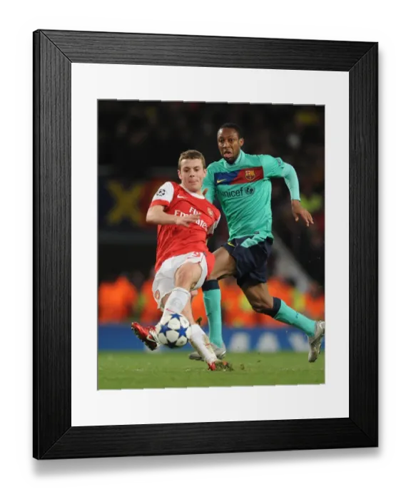 Framed Print : Arsenal's Jack Wilshere vs Barcelona's Seydou Keita: A Battle at Emirates Stadium in the UEFA Champions League (2011) Framed Print : Arsenal's Jack Wilshere vs Barcelona's Seydou Keita: A Battle at Emirates Stadium in the UEFA Champions League (2011)