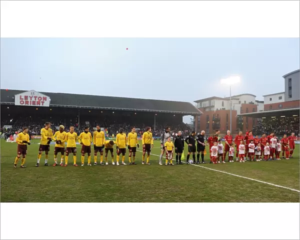 The Arsenal and Leyton Orient teams line up before the match. Leyton Orient 1: 1 Arsenal