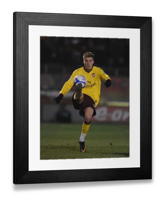 Framed Print : Bendtner's FA Cup Battle: Leyton Orient vs. Arsenal (2011)