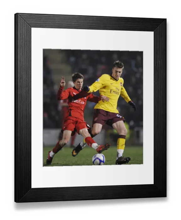 Framed Print : Nicklas Bendtner (Arsenal) Tommy Carroll (Orient). Leyton Orient 1: 1 Arsenal