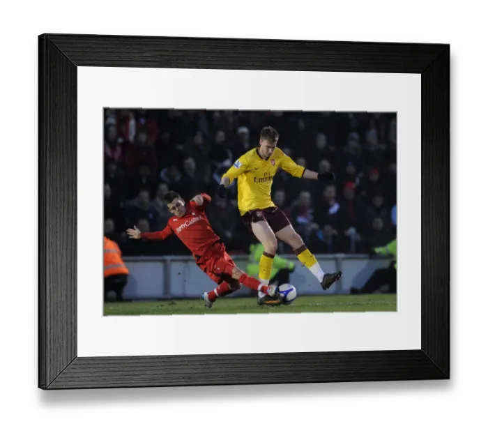 Framed Print : Nicklas Bendtner (Arsenal) Dean Cox (Orient). Leyton Orient 1: 1 Arsenal Framed Print : Nicklas Bendtner (Arsenal) Dean Cox (Orient). Leyton Orient 1: 1 Arsenal