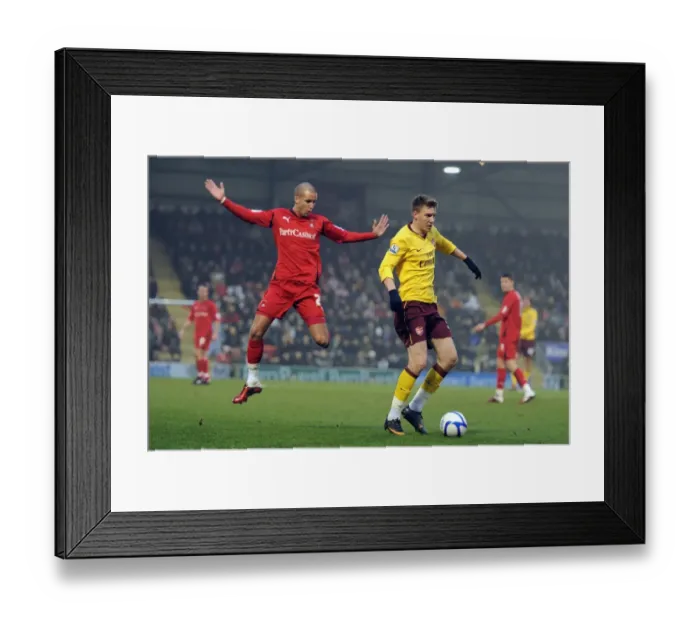 Framed Print : Nicklas Bendtner (Arsenal) Jimmy Smith (Orient). Leyton Orient 1: 1 Arsenal
