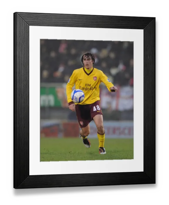 Framed Print : Arsenal's Ignasi Miquel Stands Firm in FA Cup Battle: Arsenal vs. Leyton Orient (2011)
