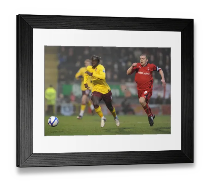Framed Print : Bacary Sagna (Arsenal) Stephen Dawson (Orient). Leyton Orient 1: 1 Arsenal