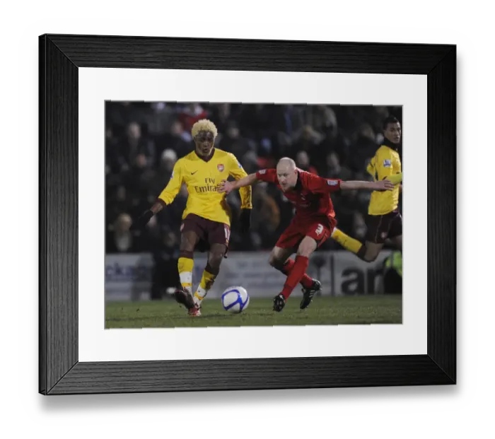 Framed Print : Alex Song (Arsenal) Andrew Whing (Orient). Leyton Orient 1: 1 Arsenal, FA Cup Fifth Round