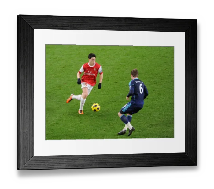 Framed Print : Samir Nasri (Arsenal) Glenn Whelan (Stoke). Arsenal 1: 0 Stoke City. Barclays Premier League Framed Print : Samir Nasri (Arsenal) Glenn Whelan (Stoke). Arsenal 1: 0 Stoke City. Barclays Premier League