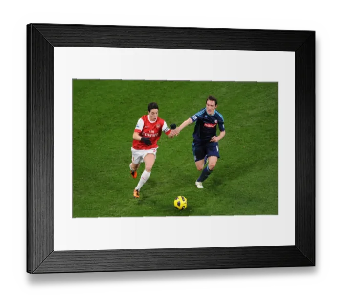 Framed Print : Samir Nasri (Arsenal) Dean Whitehead (Stoke). Arsenal 1: 0 Stoke City. Barclays Premier League Framed Print : Samir Nasri (Arsenal) Dean Whitehead (Stoke). Arsenal 1: 0 Stoke City. Barclays Premier League