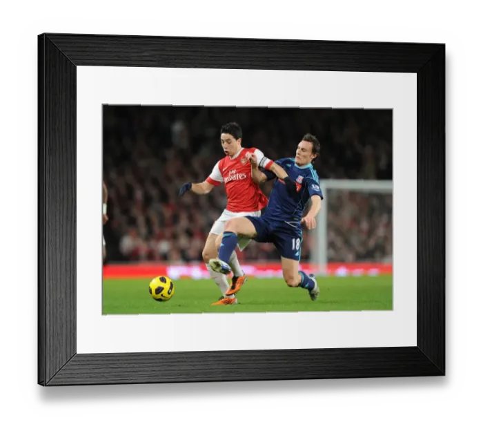 Framed Print : Samir Nasri (Arsenal) Dean Whithead (Stoke). Arsenal 1: 0 Stoke City, Barclays Premier League