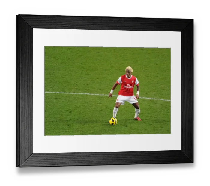 Framed Print : Alex Song (Arsenal). Arsenal 1: 0 Stoke City. Barclays Premier League. Emirates Stadium Framed Print : Alex Song (Arsenal). Arsenal 1: 0 Stoke City. Barclays Premier League. Emirates Stadium