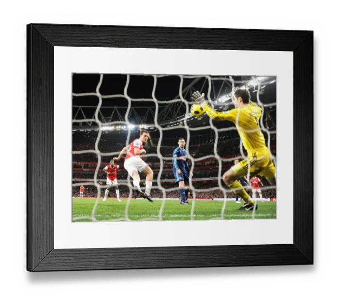 Framed Print : Sebastien Squillaci heads past Stoke goalkeeper Asmir Begovic to score the Arsenal goal Framed Print : Sebastien Squillaci heads past Stoke goalkeeper Asmir Begovic to score the Arsenal goal