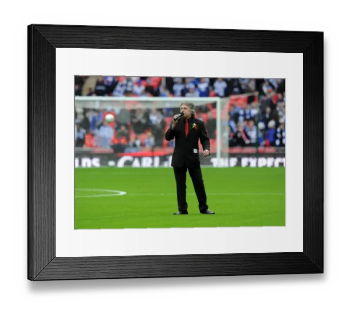 Framed Print : Paul Burrell the Arsenal PA on the pitch before the match. Arsenal 1: 2 Birmingham City