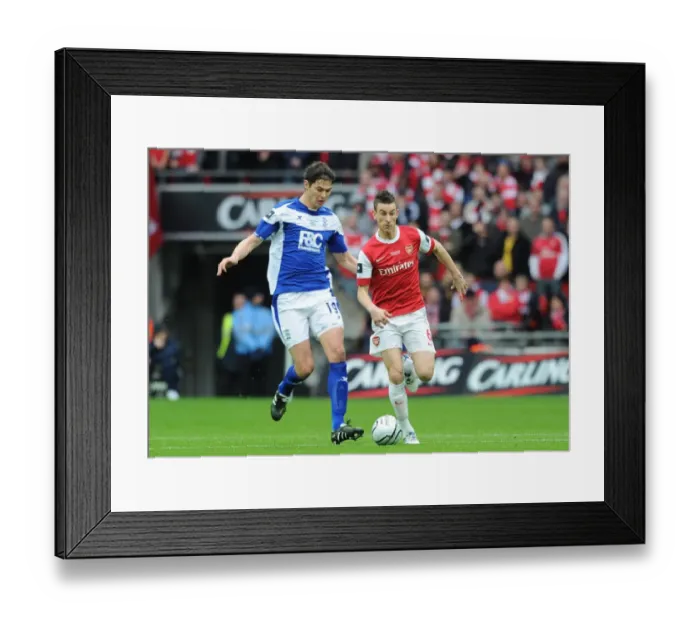 Framed Print : Koscielny's Heartbreak: Zigic Scores Twice as Birmingham City Upsets Arsenal in Carling Cup Final