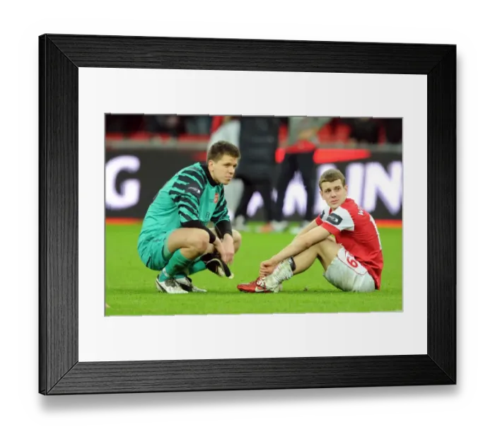 Framed Print : Wojciech Szczesny and Jack Wilshere (Arsenal) dejected after the matc. Arsenal 1 Framed Print : Wojciech Szczesny and Jack Wilshere (Arsenal) dejected after the matc. Arsenal 1