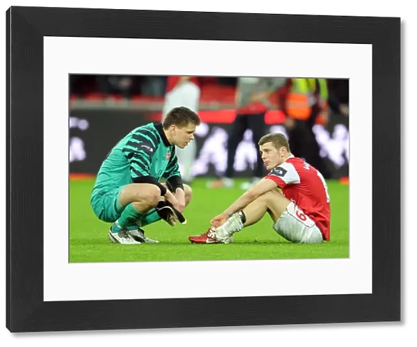 Dejected Duo: Szczesny and Wilshere After Arsenal's Carling Cup Final Defeat