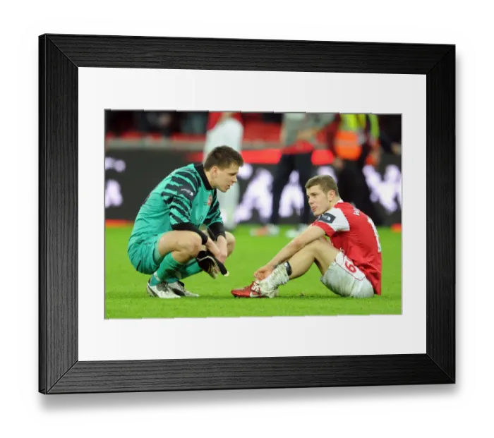 Framed Print : Dejected Duo: Szczesny and Wilshere After Arsenal's Carling Cup Final Defeat Framed Print : Dejected Duo: Szczesny and Wilshere After Arsenal's Carling Cup Final Defeat