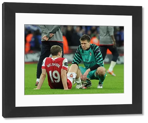 Dejected Arsenal players Wojciech Szczesny and Jack Wilshere. Arsenal 1: 2 Birmingham City