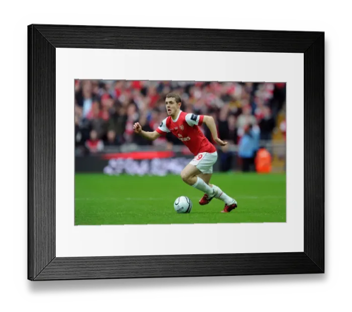 Framed Print : Jack Wilshere's Heartbreaking Performance: Arsenal's Defeat in the 2011 Carling Cup Final against Birmingham City