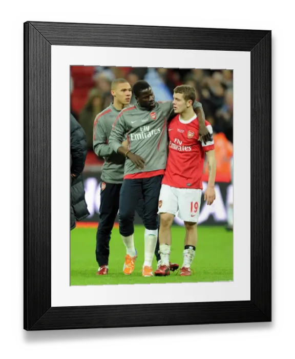 Framed Print : Jack Wilshere is consoled by Emmanuel Eboue (Arsenal) at full time. Arsenal 1