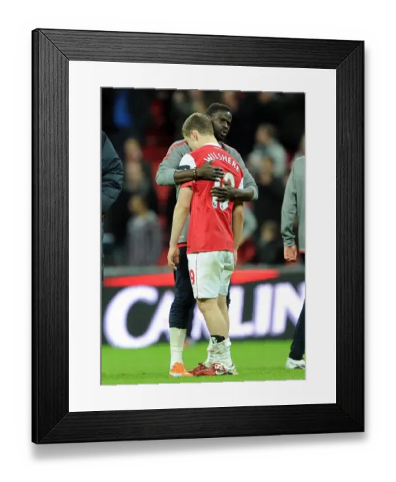 Framed Print : Jack Wilshere Consoled by Emmanuel Eboue: Arsenal's Bittersweet Carling Cup Final Moment Framed Print : Jack Wilshere Consoled by Emmanuel Eboue: Arsenal's Bittersweet Carling Cup Final Moment