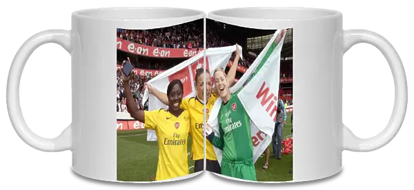 Anita Asante, Lianne Sanderson and Emma Byrne (Arsenal) celebrate winning the FA Cup
