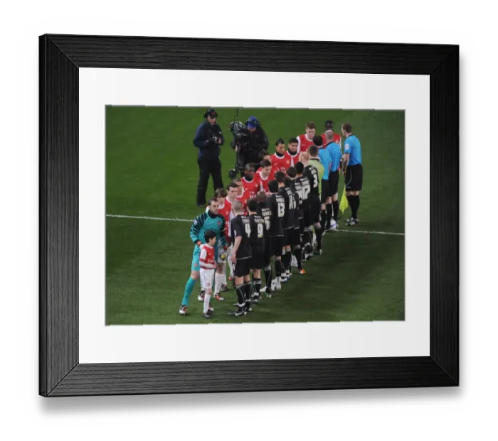 Framed Print : Arsenal captain Manuel Almunia leads out the team. Arsenal 5: 0 Leyton Orient Framed Print : Arsenal captain Manuel Almunia leads out the team. Arsenal 5: 0 Leyton Orient