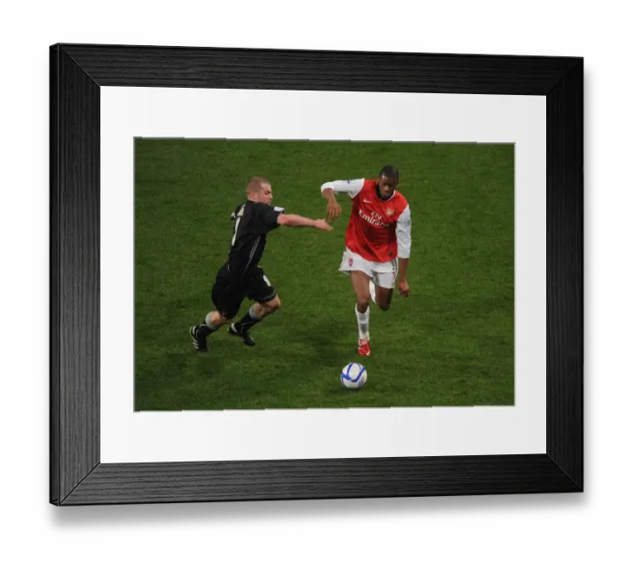 Framed Print : Abou Diaby (Arsenal) Stephen Dawson (Orient). Arsenal 5: 0 Leyton Orient