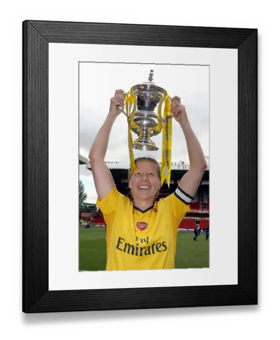 Framed Print : Arsenal Ladies Triumph: Jayne Ludlow's FA Cup Victory with the Trophy (2007)