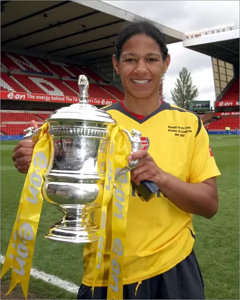 Mary Phillip (Arsenal) with the FA Cup Trophy