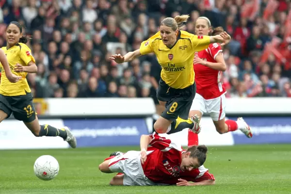 Kelly Smith (Arsenal) is fouled by Maria Bertelli (Charlton)