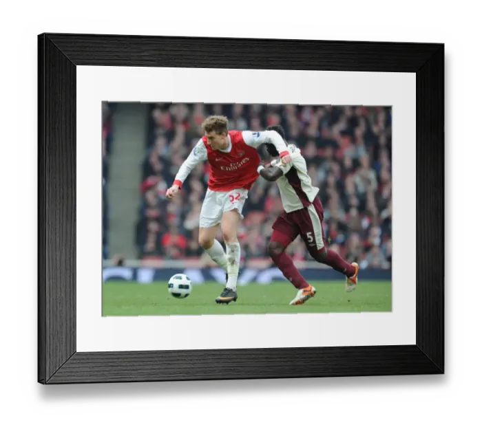 Framed Print : Nicklas Bendtner (Arsenal) John Mensah (Sunderland). Arsenal 0: 0 Sunderland