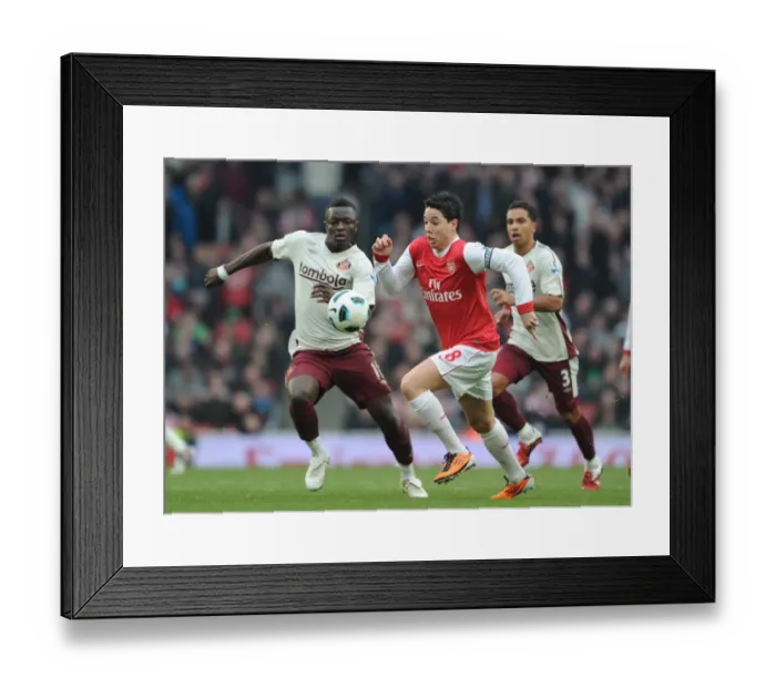 Framed Print : Nasri vs Muntari: Stalemate at Emirates as Arsenal and Sunderland Draw Framed Print : Nasri vs Muntari: Stalemate at Emirates as Arsenal and Sunderland Draw
