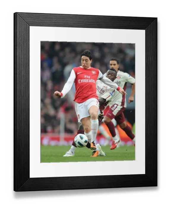Framed Print : Samir Nasri (Arsenal) Sulley Muntari (Sunderland). Arsenal 0: 0 Sunderland