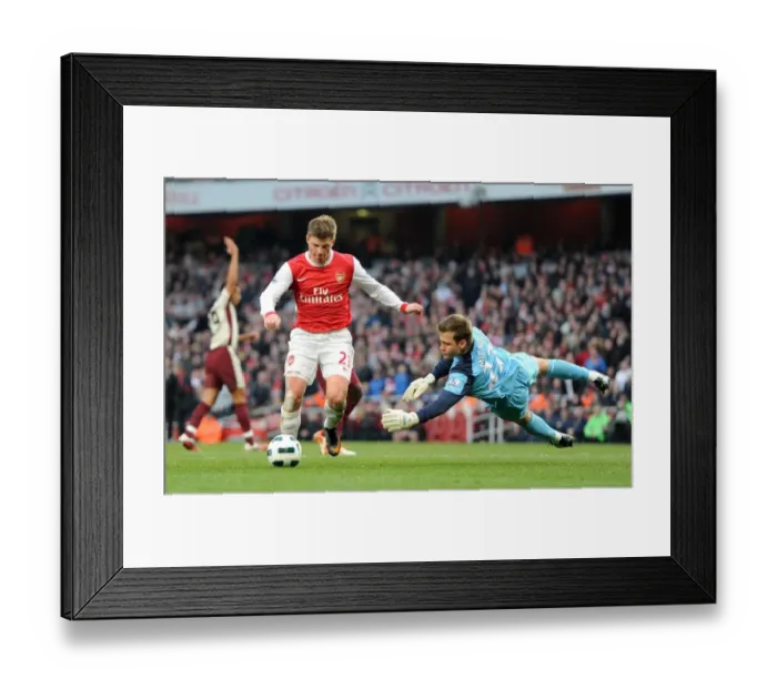Framed Print : Andrey Arshavin (Arsenal) rounds Simon Migonlet (Sunderland) to score a goal that is ruled out for offside. Arsenal 0: 0 Sunderland. Barclays Premier League. Emirates Stadium, 5 / 3 / 11. Credit : Arsenal Football Club / Framed Print : Andrey Arshavin (Arsenal) rounds Simon Migonlet (Sunderland) to score a goal that is ruled out for offside. Arsenal 0: 0 Sunderland. Barclays Premier League. Emirates Stadium, 5 / 3 / 11. Credit : Arsenal Football Club /