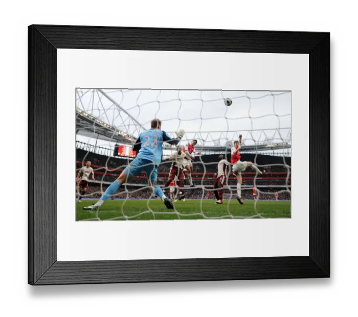 Framed Print : Marouane Chamakh (Arsenal) heads the ball against the crossbar. Arsenal 0: 0 Sunderland