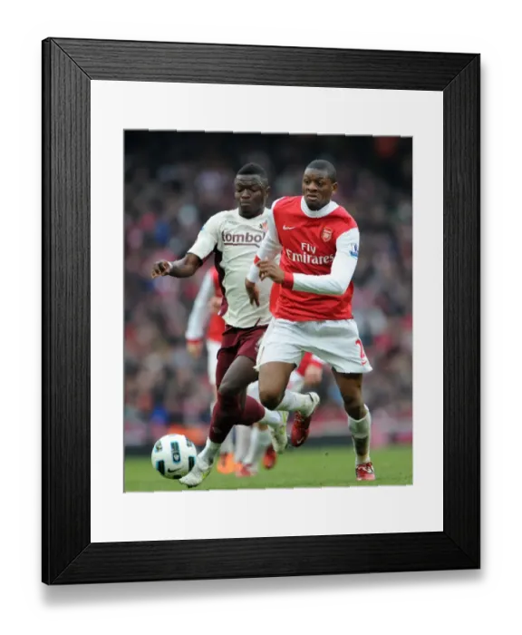 Framed Print : Abou Diaby (Arsenal) Sulley Muntari (Sunderland). Arsenal 0: 0 Sunderland