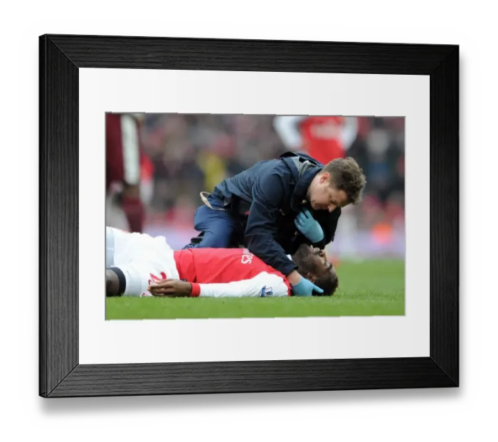 Framed Print : Johan Djourou (Arsenal) and Physio Colin Lewin. Arsenal 0: 0 Sunderland Framed Print : Johan Djourou (Arsenal) and Physio Colin Lewin. Arsenal 0: 0 Sunderland