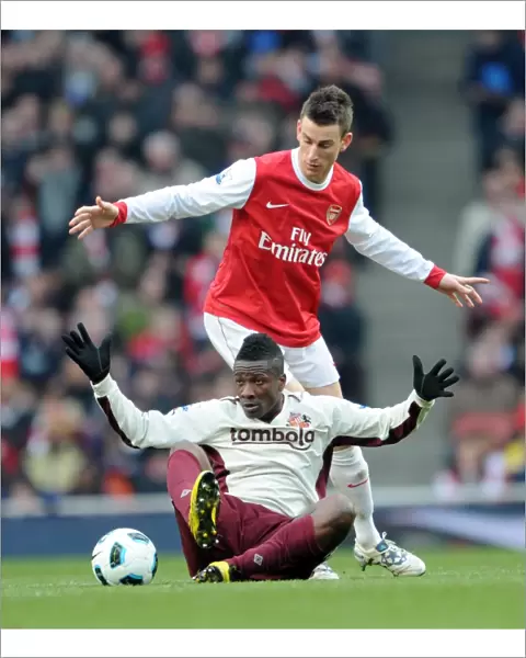 Laurent Koscielny (Arsenal) Asamoah Gyan (Sunderland). Arsenal 0: 0 Sunderland